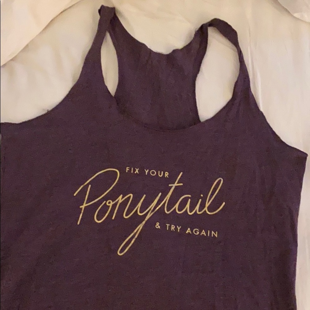 Purple racerback workout tank.